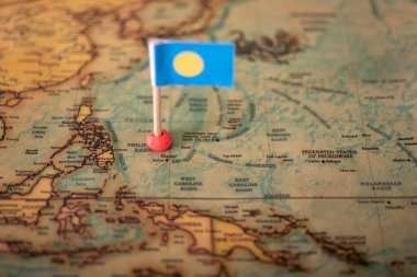 Dünya haritasında Palau bayrağı. Turizm ve eğlence kavramı..