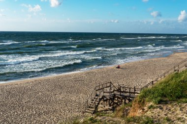 The Baltic Sea at the Curonian Spit, the beach on the sea. The concept of travel and recreation.
