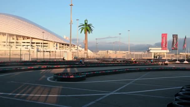 04092021 Russia, Adler, kart racing at sunset near the Olympic venues — стоковое видео