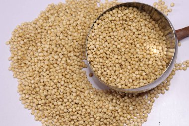 Organic jawar seeds isolated on white background