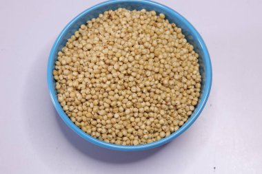 Organic jawar seeds isolated on white background