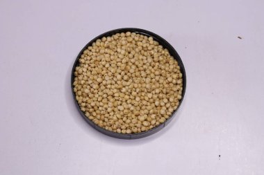 Organic jawar seeds isolated on white background