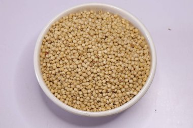 Organic jawar seeds isolated on white background