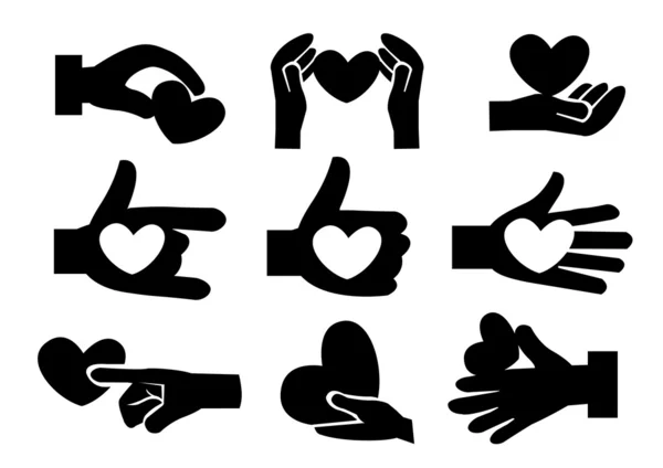 Heart in hand icons. — Stock Vector