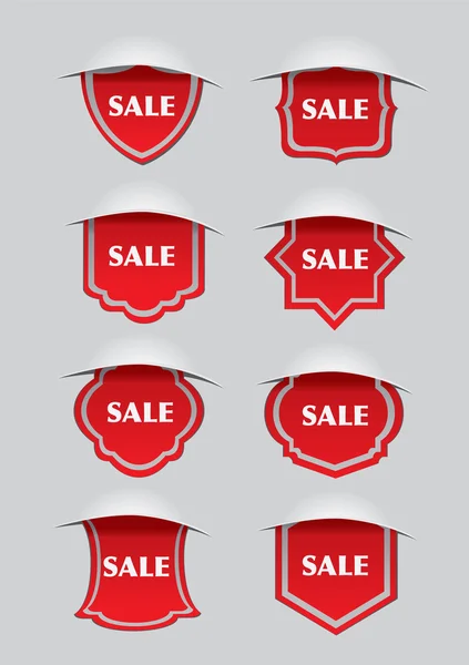 Векторный дизайн красных торговых этикеток с текстом продажи для бизнес-маркетинга — стоковый вектор