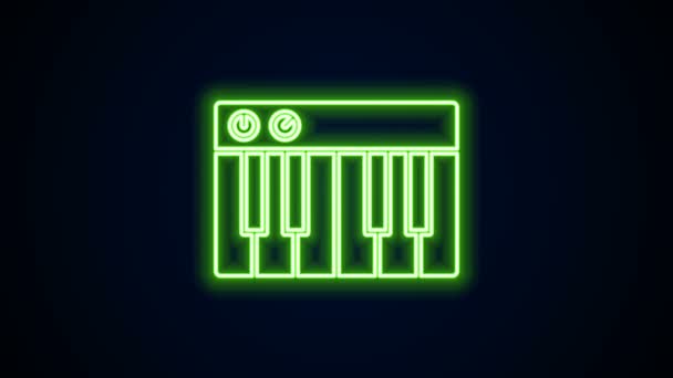 Ligne lumineuse au néon Icône de synthétiseur de musique isolée sur fond noir. Piano électronique. Animation graphique de mouvement vidéo 4K — Video