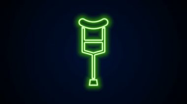 Parlayan neon çizgisi ya da koltuk değneği simgesi siyah arkaplanda izole edilmiş. Kas iskeleti hastalığı olan insanların rehabilitasyonu için gerekli ekipman. 4K Video hareketli grafik canlandırması