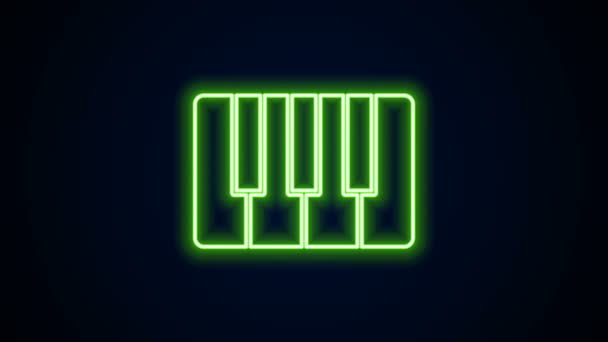 Leuchtendes Neon Line Musik-Synthesizer-Symbol isoliert auf schwarzem Hintergrund. Elektronisches Klavier. 4K Video Motion Grafik Animation — Stockvideo