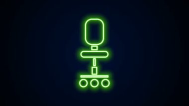 Parlayan neon hattı ofis koltuğu simgesi siyah arkaplanda izole edildi. 4K Video hareketli grafik canlandırması