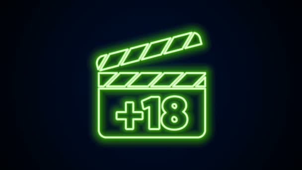 Glowing neon line Movie clapper with 18 plus content icon isolated on black background. Age restriction symbol. Adult channel. 4K Video motion graphic animation — Stock Video