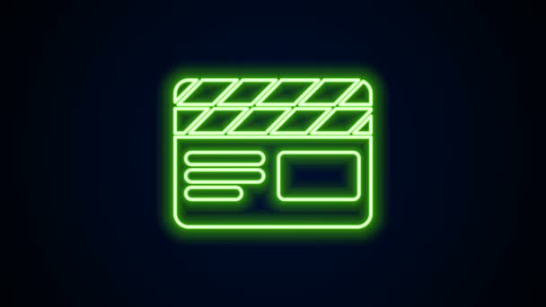 Žhnoucí neonová čára Ikona tleskače filmu izolovaná na černém pozadí. Filmová tabule. Nápis Clapperboard. Filmová produkce nebo mediální průmysl. Grafická animace pohybu videa 4K — Stock video