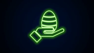 Parlayan neon hattı insan eli ve paskalya yumurtası simgesi siyah arka planda izole edilmiş. Mutlu Paskalyalar. 4K Video hareketli grafik canlandırması