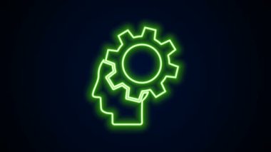 Parlak neon hattı insan kafası ve siyah arka planda izole edilmiş ikon içerisindeki ekipman. Yapay zeka. Düşünen beyin. Beynin sembol çalışması. 4K Video hareketli grafik canlandırması