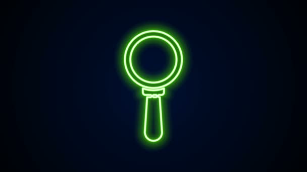 Glowing neon line Magnifying glass icon isolated on black background. Search, focus, zoom, business symbol. 4K Video motion graphic animation — Stock Video