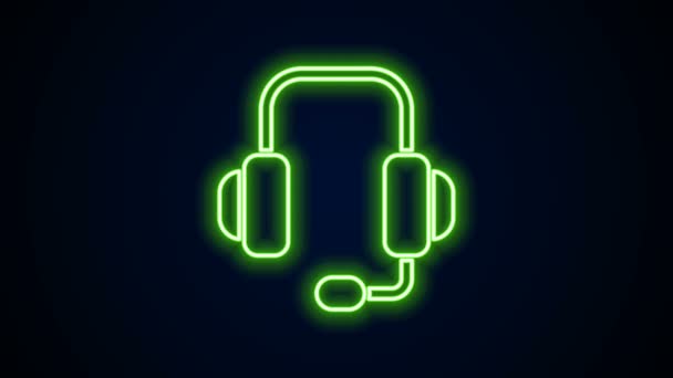 Gloeiende neon lijn Koptelefoon pictogram geïsoleerd op zwarte achtergrond. Ondersteuning klantenservice, hotline, call center, faq, onderhoud. 4K Video motion grafische animatie — Stockvideo