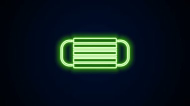 Parlayan neon hattı tıbbi koruyucu maske simgesi siyah arkaplanda izole edildi. 4K Video hareketli grafik canlandırması