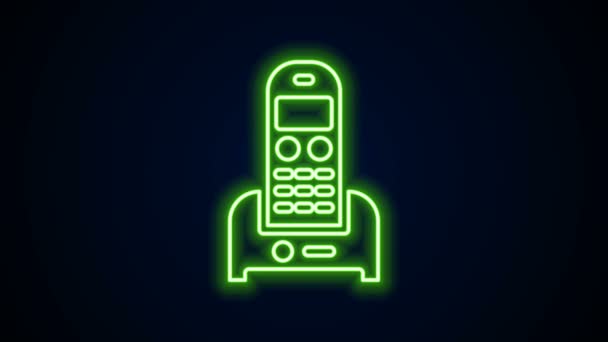 Glowing neon line Telephone icon isolated on black background. Landline phone. 4K Video motion graphic animation — Stock Video