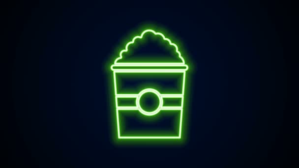 Leuchtende Leuchtschrift Popcorn in Karton-Symbol isoliert auf schwarzem Hintergrund. Popcorn-Eimerbox vorhanden. 4K Video Motion Grafik Animation — Stockvideo