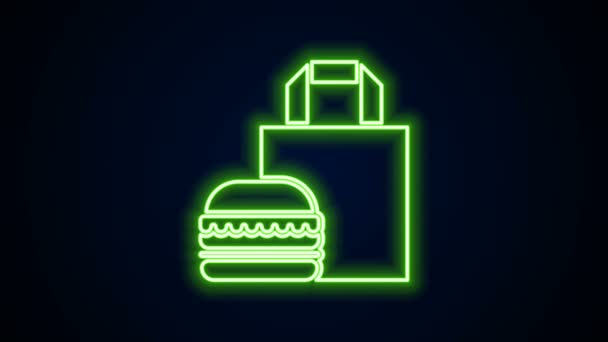 Glödande neon line Online beställning och hamburgare leverans ikon isolerad på svart bakgrund. 4K Video motion grafisk animation — Stockvideo