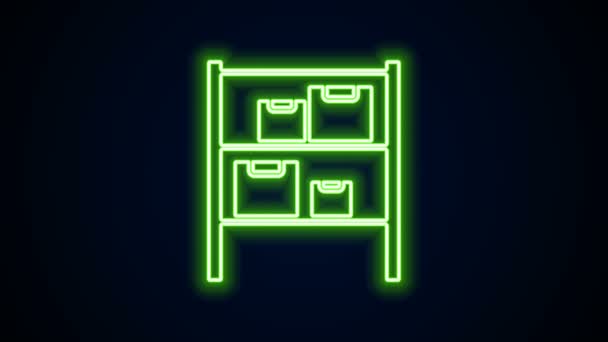 Gloeiende neon lijn Pakhuis pictogram geïsoleerd op zwarte achtergrond. 4K Video motion grafische animatie — Stockvideo