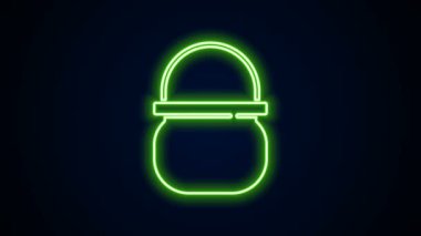 Parlayan neon hattı cadılar bayramı cadı kazanı simgesi siyah arka planda izole edildi. Mutlu Cadılar Bayramı Partisi. 4K Video hareketli grafik canlandırması