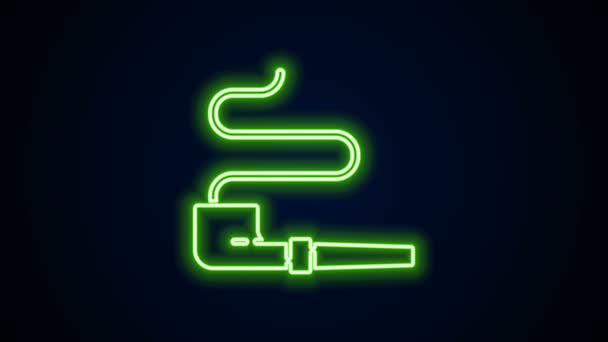 Glowing neon line Native American indian smoking pipe icon isolated on black background. 4K Video motion graphic animation — Stock Video