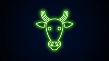 Parlayan neon hattı İnek kafası simgesi siyah arkaplanda izole edildi. 4K Video hareketli grafik canlandırması