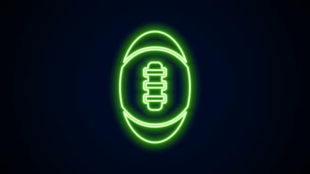 Leuchtende Leuchtschrift American Football Ball Ikone isoliert auf schwarzem Hintergrund. Rugby-Ball-Ikone. Mannschaftssportspiel-Symbol. 4K Video Motion Grafik Animation — Stockvideo