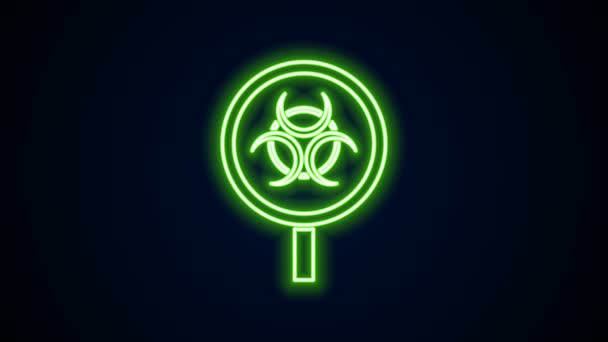 Glowing neon line Biohazard and magnifying glass icon isolated on black background. 4K Video motion graphic animation — Stock Video