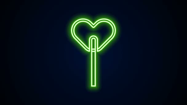 Glowing neon line Lollipop icon isolated on black background. Food, delicious symbol. 4K Video motion graphic animation — Stock Video