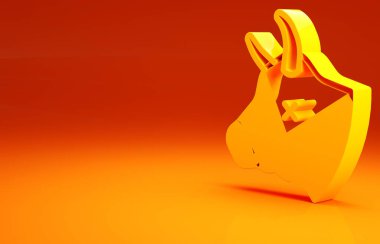 Sarı İnek ikonu turuncu arka planda izole edildi. Minimalizm kavramı. 3d illüstrasyon 3B canlandırma.