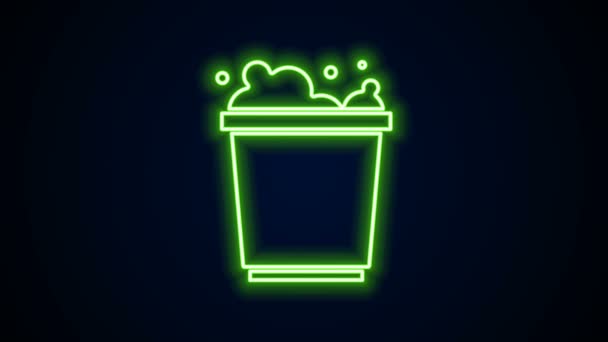Glowing neon line Bucket with foam and bubbles icon isolated on black background. Cleaning service concept. 4K Video motion graphic animation — Stock Video