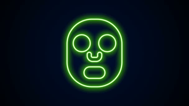 Glowing neon line Facial cosmetic mask icon isolated on black background. Cosmetology, medicine and health care. 4K Video motion graphic animation — Stock Video