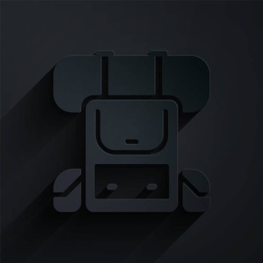 Kağıt kesiği Yürüyüş sırt çantası simgesi siyah arkaplanda izole edildi. Kamp ve dağ gezisi sırt çantası. Kağıt sanatı tarzı. Vektör.