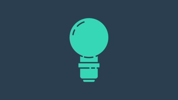 Türkis Glühbirne mit Konzept der Idee Symbol isoliert auf blauem Hintergrund. Energie und Ideensymbolik. Inspirationskonzept. 4K Video Motion Grafik Animation — Stockvideo