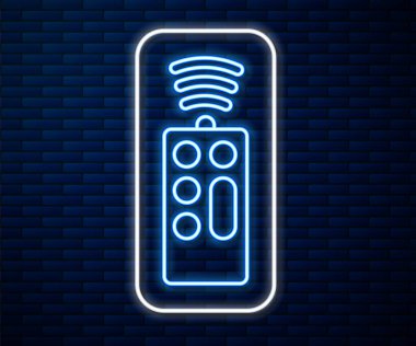 Parlayan neon hattı uzaktan kumanda simgesi tuğla duvar arka planında izole edildi. Vektör.