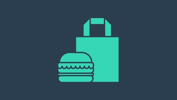 Бирюзовый онлайн заказ и иконка доставки бургеров изолированы на синем фоне. Видеографическая анимация 4K — стоковое видео