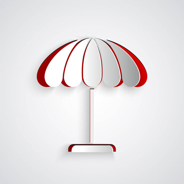 Paper cut Sun protective umbrella for beach icon isolated on grey background. Large parasol for outdoor space. Beach umbrella. Paper art style. Vector Illustration.