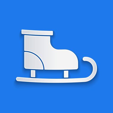 Kağıt kesikli buz pateni ikonu mavi arkaplanda izole edildi. Buz pateni ayakkabısı ikonu. Kılıçlı spor botlar. Kağıt sanatı tarzı. Vektör.
