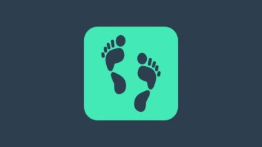 Turkuaz insan ayak izi simgesi mavi arkaplanda izole edildi. İnsan ayağı izi. 4K Video hareketli grafik canlandırması