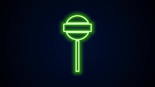 Gloeiende neon lijn Lollipop pictogram geïsoleerd op zwarte achtergrond. Eten, heerlijk symbool. 4K Video motion grafische animatie — Stockvideo