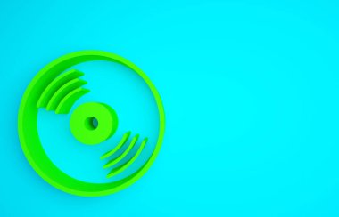 Mavi arkaplanda yeşil Vinil disk simgesi izole edildi. Minimalizm kavramı. 3d illüstrasyon 3B canlandırma.