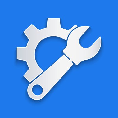 Kağıt kesiği İngiliz anahtarı ve vites simgesi mavi arkaplanda izole edilmiş. Ayarlama, servis, ayar, bakım, onarım, onarım. Kağıt sanatı tarzı. Vektör İllüstrasyonu.