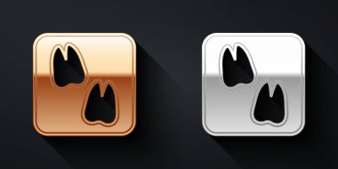 Siyah arkaplanda altın ve gümüş deve pençesi ayak izi ikonu var. Uzun gölge tarzı. Vektör.