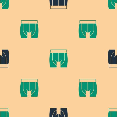 Yeşil ve siyah bisiklet şortları simgesi bej arka planda izole edilmiş pürüzsüz desen. Vektör.