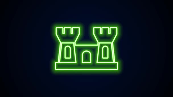 Gloeiende neon lijn Zand kasteel pictogram geïsoleerd op zwarte achtergrond. 4K Video motion grafische animatie — Stockvideo