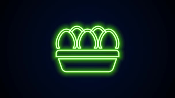 Glowing neon line Chicken egg in box icon isolated on black background. 4K Video motion graphic animation — Stock Video