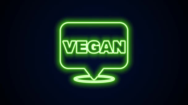 Linha de néon brilhante ícone de dieta alimentar Vegan isolado no fundo preto. Orgânico, bio, símbolo ecológico. Vegan, sem carne, sem lactose, alimentos saudáveis, frescos e não violentos. Animação gráfica em movimento de vídeo 4K — Vídeo de Stock