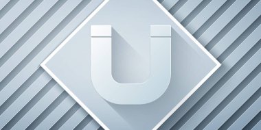 Kağıt kesiği Mıknatıs simgesi gri arkaplanda izole edildi. At nalı mıknatısı, manyetizma, manyetizma, çekim. Kağıt sanatı tarzı. Vektör.