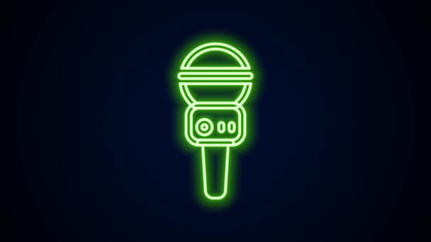 Glowing neon line Microphone icon isolated on black background. On air radio mic microphone. Speaker sign. 4K Video motion graphic animation — Stock Video